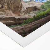 Vibrant rolled canvas depicting a serene landscape with intricate cave formations, showcasing rich earth tones and textures, ideal for home decor accent.