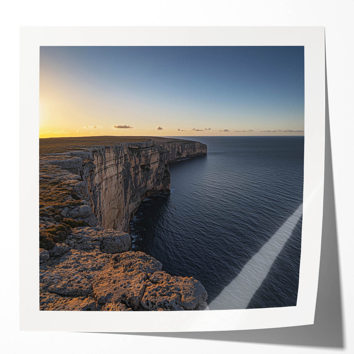 Stunning landscape photo print mockup showcasing dramatic cliffs and vibrant skies, designed for artistic display in home decor or office settings, featuring a glossy finish.