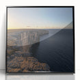 Framed acrylic artwork showcasing a stunning landscape of cliffs, featuring rich colors and intricate details, emphasizing depth and natural beauty in a modern black frame.