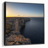 Framed canvas artwork depicting a scenic landscape of majestic cliffs in vibrant colors, showcasing a black frame from a side view, perfect for home decor.