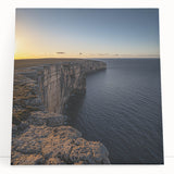 Stretched canvas artwork depicting a breathtaking landscape with dramatic cliffs under a vibrant sky, ideal for enhancing home decor and inspiring tranquility. The piece showcases rich colors and detailed textures, making it a perfect focal point for any room.