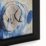 Close-up of an abstract splattered canvas print with vibrant colors and intricate textures, framed elegantly, enhancing modern decor aesthetics.