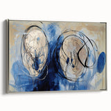 Framed canvas artwork showcasing abstract splatters in vibrant colors, highlighted by a sleek silver frame. Ideal for modern home decor, adding a splash of creativity.
