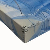 Close-up of an abstract splatter design on a stretched canvas, showcasing vibrant colors and dynamic patterns, perfect for modern art decor. Ideal for home or office settings, this artwork adds a contemporary touch to any space.