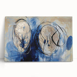 Abstract canvas art print featuring vibrant splatter patterns in shades of blue, yellow, and red, perfect for modern home decor or office spaces.