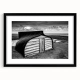 Black-framed landscape barn wall art featuring a rustic design, complete with a white mat, perfect for home decor enhancement and farmhouse aesthetics.