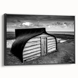 Framed canvas wall art showcasing a scenic landscape featuring a rustic barn, presented in a sleek black frame. The piece adds a touch of countryside charm to any decor, emphasizing earthy tones and a serene atmosphere. Perfect for enhancing living spaces or as a thoughtful gift for art lovers.