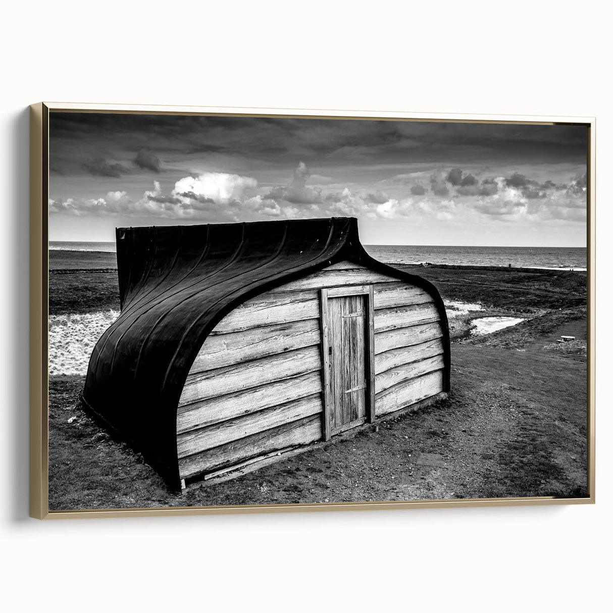 Framed canvas wall art depicting a serene landscape with a barn, featuring rich gold tones and a textured finish, ideal for home decor enhancement.