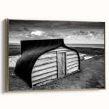 Framed canvas wall art depicting a serene landscape with a barn, featuring rich gold tones and a textured finish, ideal for home decor enhancement.