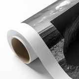 Rolled canvas wall art depicting a serene landscape with a rustic barn, featuring earthy tones and rich textures, ideal for farmhouse décor.