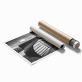 Landscape barn wall art print showcasing a rustic red barn surrounded by lush greenery and a vibrant blue sky, rolled for easy framing and display. Perfect for farmhouse decor enthusiasts.