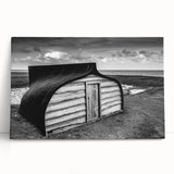 Stretched canvas artwork showcasing a serene landscape with a rustic barn, vibrant greens, and soft blues, perfect for enhancing home décor with a countryside charm.