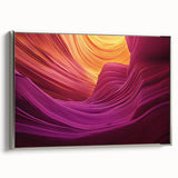 Framed canvas artwork depicting a stunning landscape of canyons in vibrant colors, showcased from a silver side view, perfect for home decor and enhancing any space's aesthetic.