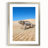 Framed desert landscape artwork with a silver mat, showcasing vibrant hues of orange and blue, perfect for enhancing modern home decor.