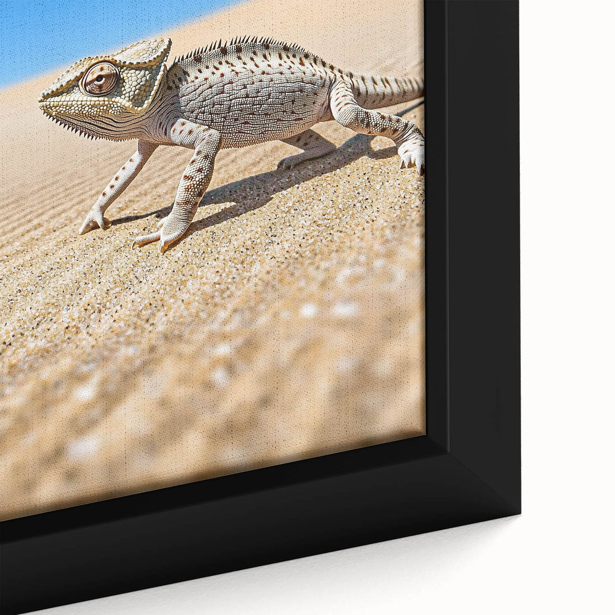 Close-up of a framed canvas showcasing a vibrant desert landscape design, featuring warm tones of orange and red, perfect for home decor. Ideal for nature lovers.