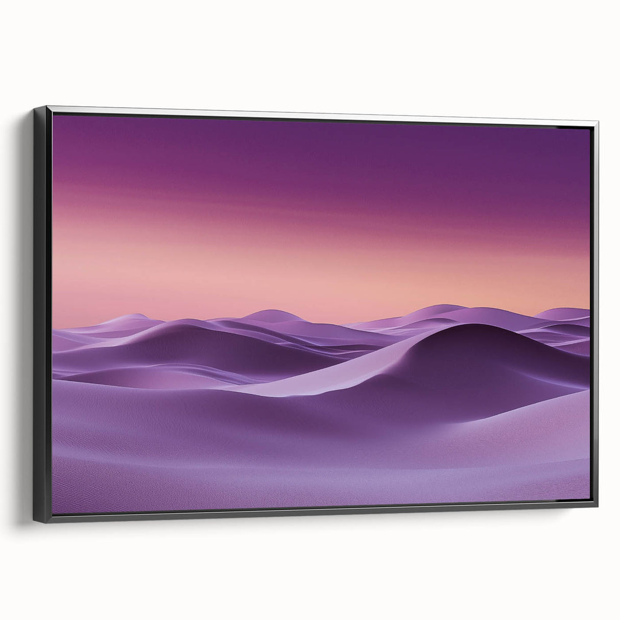 Framed canvas artwork showcasing a stunning desert dune landscape in warm earth tones, presented in a sleek black frame, perfect for modern home decor.