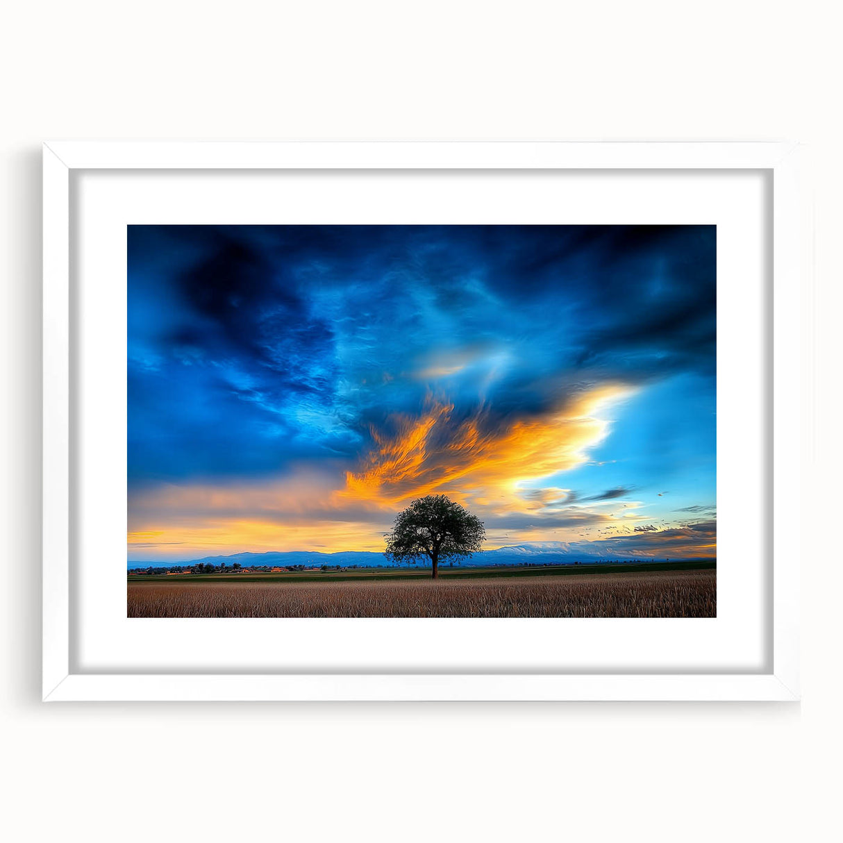 Framed landscape artwork featuring expansive green fields and a serene sky, with a white mat and frame, ideal for home decor or office enhancement.