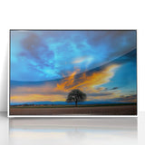 Framed acrylic art piece showcasing a vibrant landscape of lush green fields under a blue sky, featuring a sleek white frame for a modern touch, perfect for home décor.