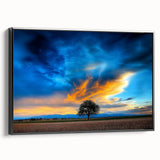 Framed canvas artwork depicting vibrant fields landscape in soothing earth tones, showcased from a black side view, perfect for home decor or gallery display.