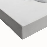 Close-up of a stretched canvas showcasing a vibrant landscape design, featuring rich colors and intricate details, ideal for home decor or art enthusiasts.