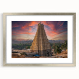 Textured abstract art print of a serene Indian landscape in muted earth tones, framed in silver, ideal for bedroom art.