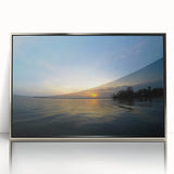 Mid-century modernist art depicting a Yucatan scenery in muted earth tones on a silver-framed acrylic.