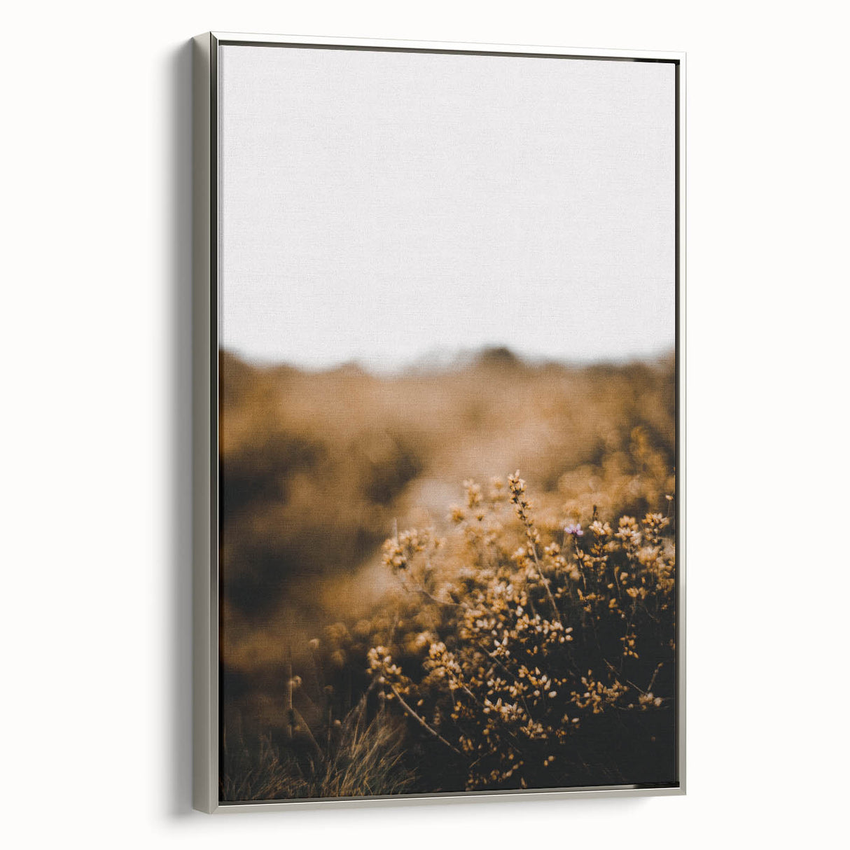 Framed canvas depicting a vintage-style landscape art painting with colorful autumn trees and a black background.