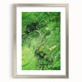 Textured art featuring abstract designs in pastel shades on a silver-framed mat, ideal for bedroom decor.