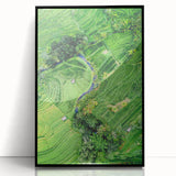 Large abstract wall art depicting spring themes, in vibrant green and yellow tones, framed in black acrylic.