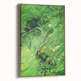 Framed canvas depicting a vintage-style landscape with spring motifs in gold and black tones, ideal for bedroom wall art.