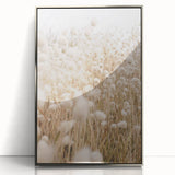 Mid-century modernist art depicting abstract shapes in pastel shades on a silver-framed acrylic print.