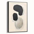 Framed canvas wall art showcasing an abstract minimalist design in black, presented in a side view, ideal for modern home decor. Perfect for stylish interior accents.