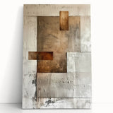 Abstract minimalist wall art on stretched canvas, showcasing muted beige and gray tones, elegantly leaning against a wall, perfect for modern decor.