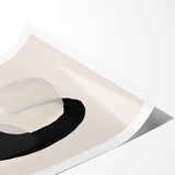 Abstract minimalist wall art print featuring soft pastel colors and geometric shapes, elegantly rolled for easy framing and display in modern interiors.