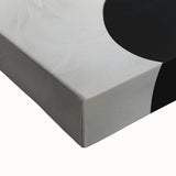 Close-up of abstract minimalist wall art on stretched canvas, showcasing soft pastel colors and geometric shapes, perfect for modern home decor.