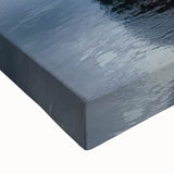 Close-up of a stretched canvas featuring a vibrant landscape with a majestic castle, showcasing intricate details and rich colors, perfect for home decor.