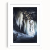 Framed landscape artwork featuring a serene cave scene, elegantly matted in white, showcasing intricate details and natural colors, perfect for home decor.