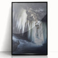 Framed acrylic artwork showcasing a stunning landscape of a cave scene in vibrant colors, featuring a sleek black frame that enhances its modern aesthetic.