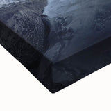 Close-up of a stretched canvas showcasing a vibrant landscape painting with intricate cave details, featuring earthy tones and textures, perfect for home decor.