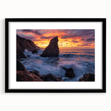 Framed landscape print showcasing dramatic cliffs and a serene sky, set in a sleek black matting that enhances the artwork's colors and depth. Perfect for modern home decor.