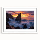 Framed landscape artwork showcasing dramatic cliffs and serene natural scenery, with a white mat enhancing its elegance, perfect for home decor or office spaces.