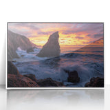 Framed acrylic artwork depicting a stunning landscape of cliffs with a serene ocean view, featuring vibrant colors and a sleek white frame, ideal for modern home decor.