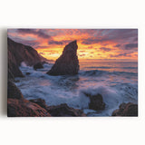 Stretched canvas artwork depicting a breathtaking landscape of cliffs under a vibrant sky, showcasing rich colors and dramatic textures, perfect for home decor.
