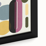 Close-up of a framed abstract geometric canvas artwork showcasing vibrant colors and intricate shapes, perfect for modern home decor or art collections.