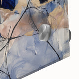 Close-up of colorful abstract acrylic splatters on glass, showcasing vibrant hues of blue, yellow, and red, ideal for modern home decor.