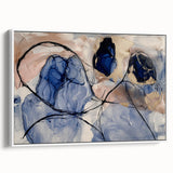 Framed canvas artwork showcasing a vibrant abstract splatter design with shades of blue, red, and yellow, displayed from a side view against a neutral background. Perfect for modern home decor, this piece adds a dynamic and colorful touch to any space.
