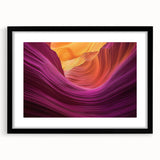 Framed landscape artwork showcasing vibrant canyons in rich earth tones, featuring a sleek black mat and elegant frame, ideal for enhancing home decor.