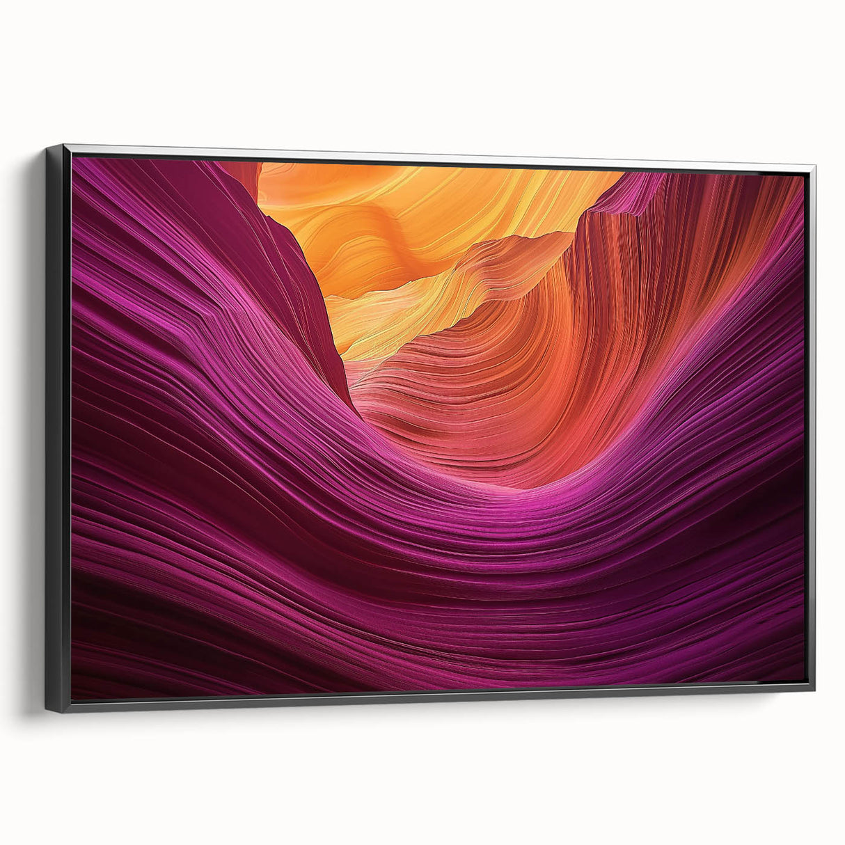 Framed canvas art showcasing a stunning landscape of vibrant canyons in warm earth tones, elegantly displayed with a sleek black frame, perfect for home decor.