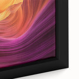 Close-up of a framed landscape canvas depicting vibrant canyons with rich textures and earthy colors, perfect for home decor and nature enthusiasts.