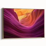 Framed canvas artwork depicting colorful canyons in a landscape view, featuring a gold frame and side profile, perfect for home decor and nature enthusiasts.
